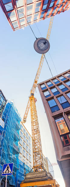 istock Construction crane above high-rise buildings, Stockholm, Sweden 977373324