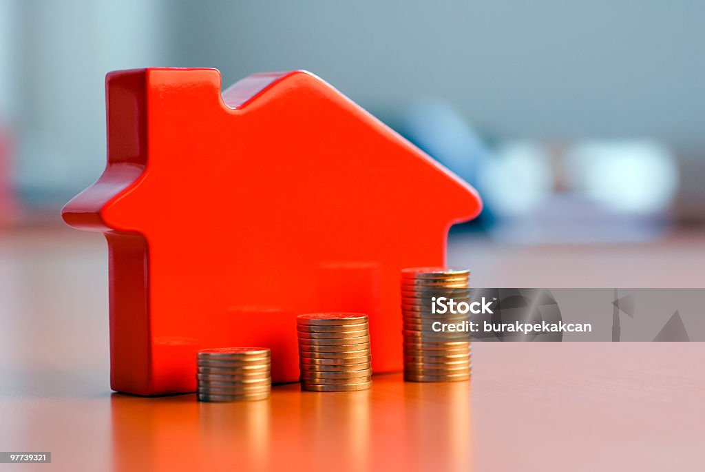 Red 3D house model next to growing stacks of coins /file_thumbview_approve.php?size=1&id=6671515 House Stock Photo