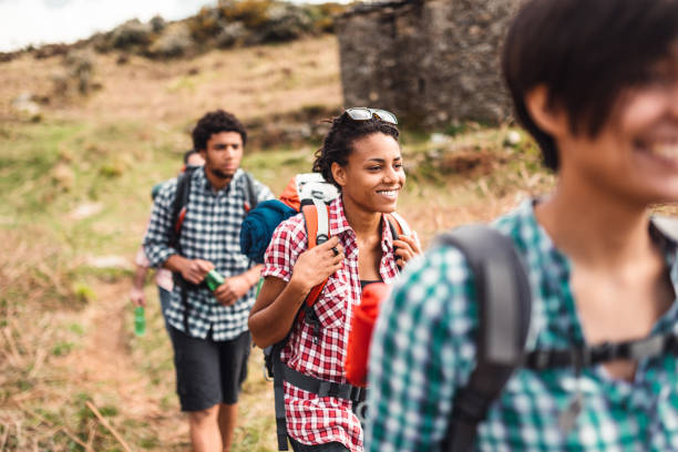 istock friends hiking in the mountains 977404844
