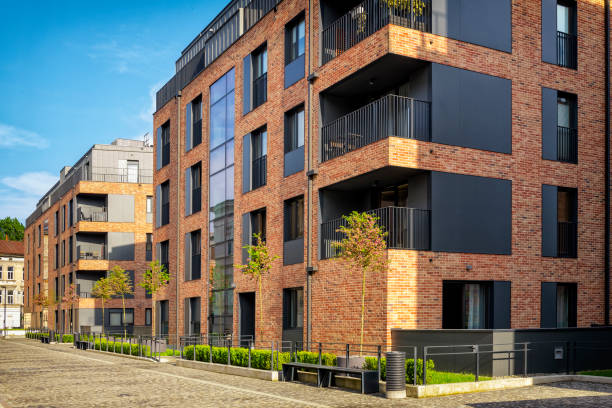 istock New complex of apartment buildings with a brick facade 977406094