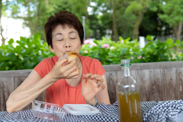 Japanese woman having picnic