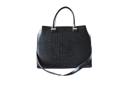 Luxury beautiful black leather crocodile black female bag on a white background