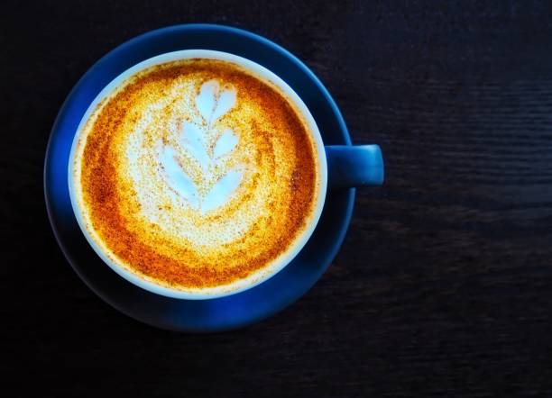 istock Turmeric Latte With Beautiful Latte Art 977418990