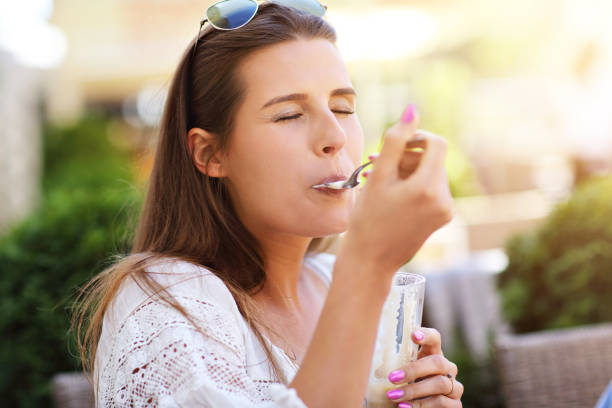 istock Happy girl in cafe during summer time 977422054