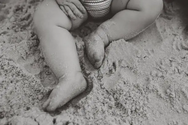 Baby toes in sand