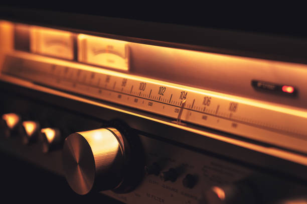 istock Stereo radio FM scale with vintage dials close up 977433706
