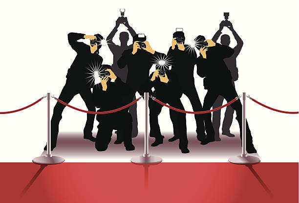 Paparazzi Photographers at the Red Carpet. paparazzi photographer illustrations stock illustrations