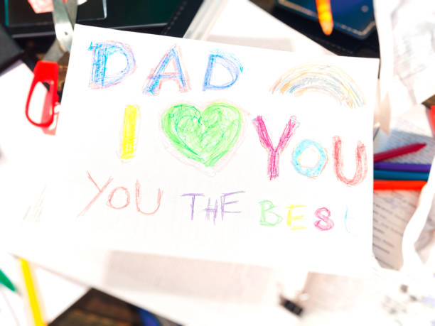 istock Father's day greeting from kids 977438540