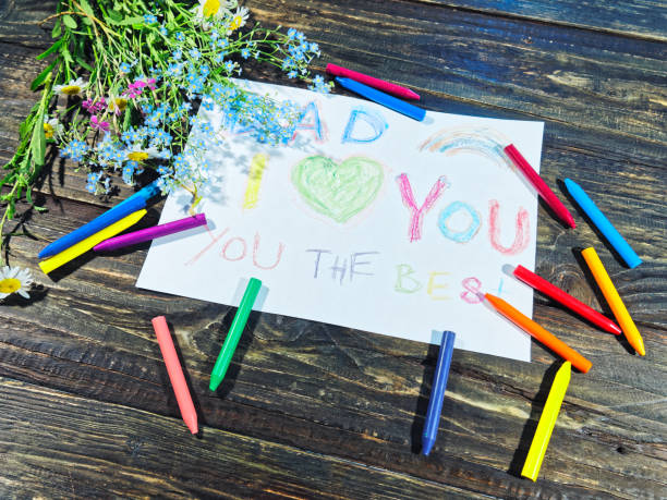 istock Father's day greeting from kids 977438604
