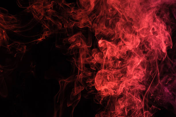 istock red spiritual smoke on black background with copy space 977442562