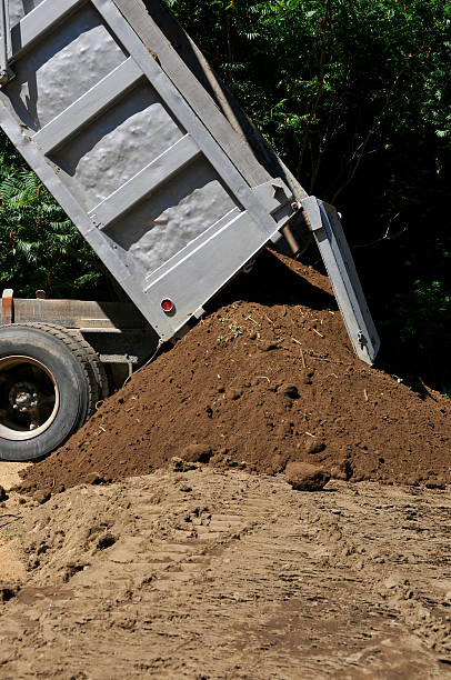 istock Dumptruck with Loam Pile 97744357