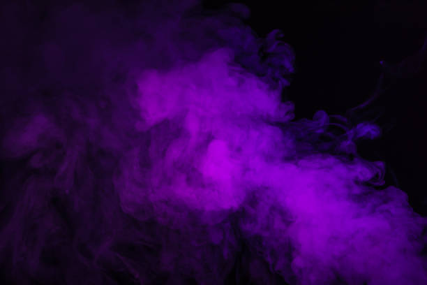 istock purple spiritual smoke on black background 977443702