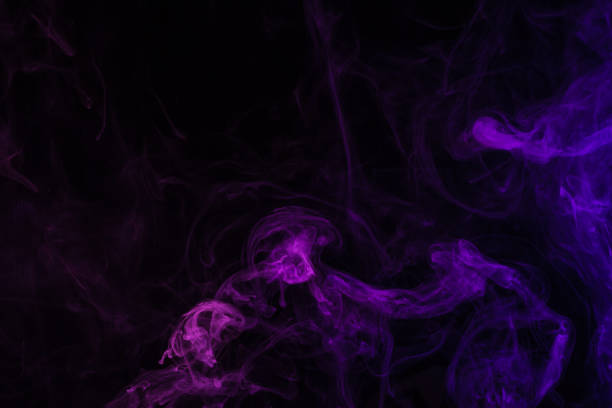istock purple smoky curves on black background 977443814