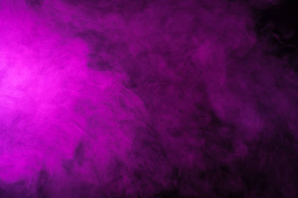 istock abstract pink smoke on black background 977446794