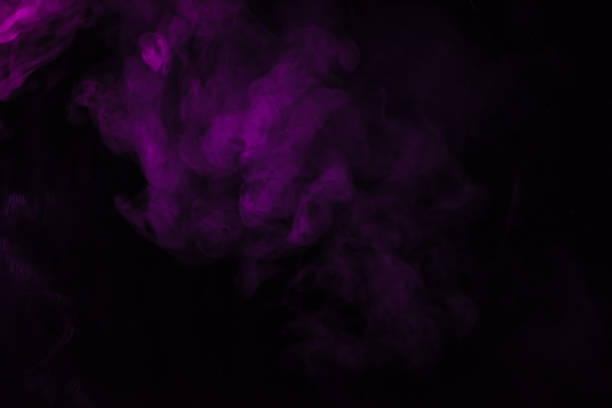 istock abstract fantasy black background with violet smoke 977447562