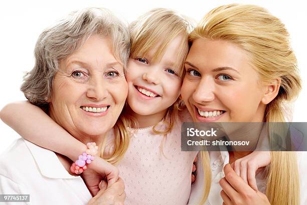 Strong Hugging Stock Photo - Download Image Now - 30-39 Years, 70-79 Years, Active Seniors