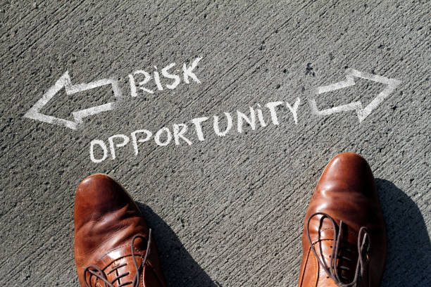 Time to decide: Risk or Opportunity stock photo