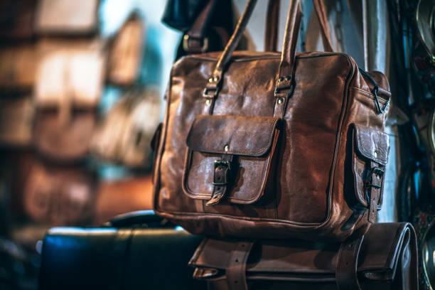 Vintage Brown Leather Bag Hanging in The Shop stock photo