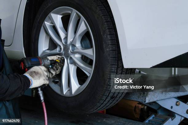 Car Repair Shop Stock Photo - Download Image Now - Tire - Vehicle Part, Turning, Service