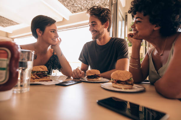 istock Friends meeting at a cafe 977463474
