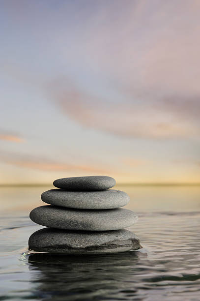 istock Tower of stones in calm water 97747811