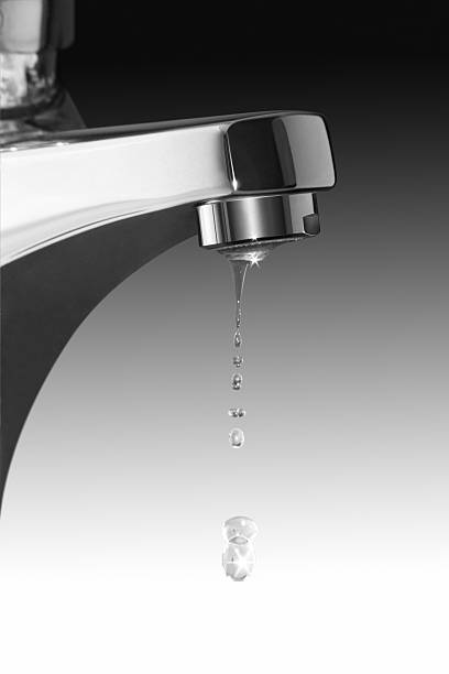 istock dripping faucet and water drops 97748069