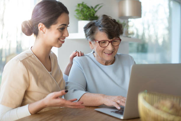 istock Elderly woman searching Internet 977484340