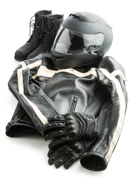 istock Motorcycle helmet, gloves, jacket and boots isolated on white background. 977484724