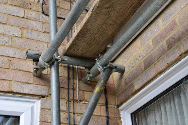 istock Scaffolding pipe crossing on a Scaffold tower looking up from underneath. 977491956