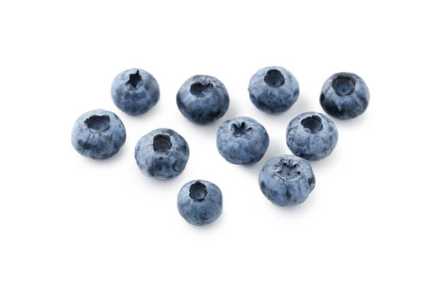 istock Ripe blueberries isolated on white background 977496710