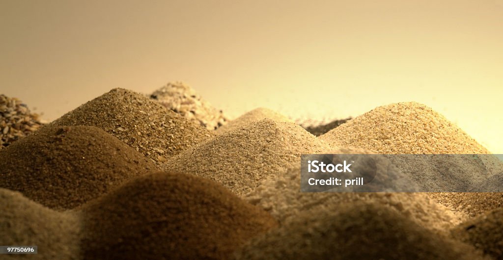 Montones de arena en un ambiente cálido - Foto de stock de Abstracto libre de derechos