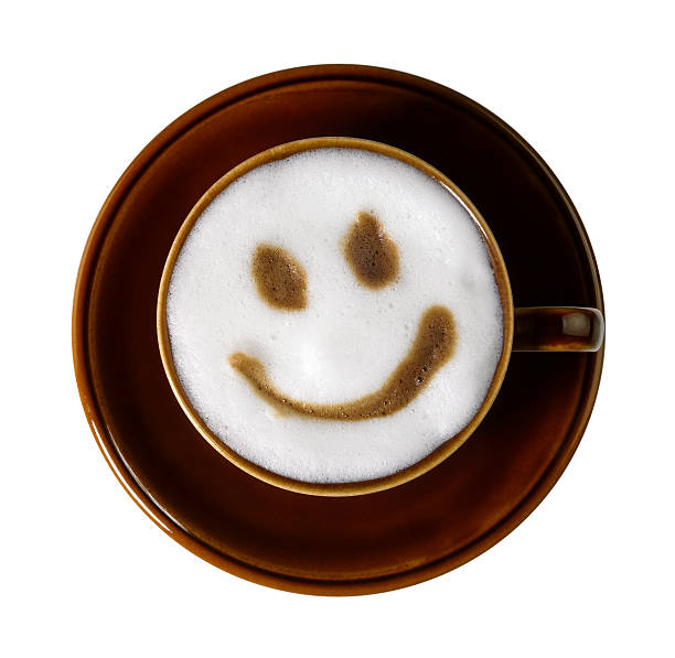 cup of coffee with smiley on milk froth