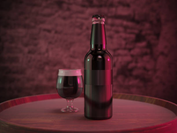 istock Ale bottle and beer glass on wood 977509686