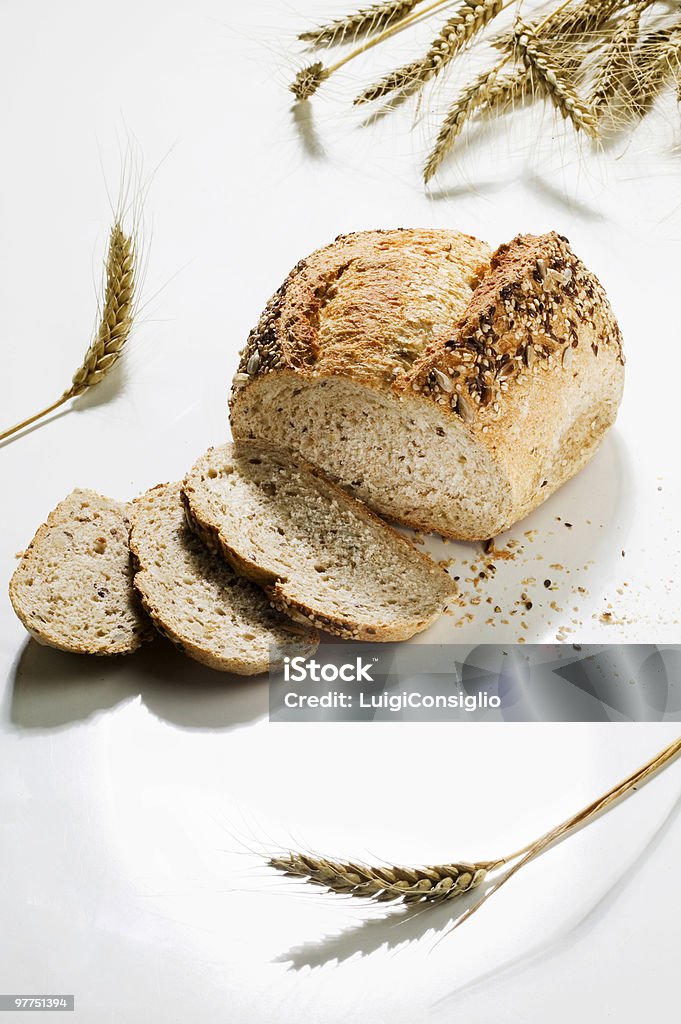 Wholemeal nto fatia de pão - Foto de stock de Agricultura royalty-free