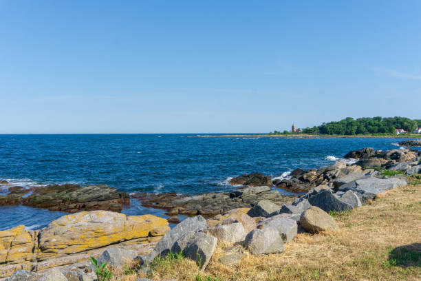 istock Beautiful beach view with lighthouse in Denmark, Bornholm 977548288