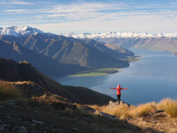 istock Young woman viewing mountain landscape 977581068