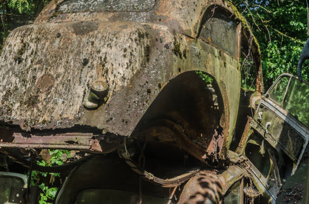 istock Rusty car parts in the forest 977586626