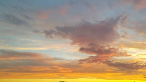 istock Dramatic sunset or sunrise sky with clouds. Natural background. 977593060