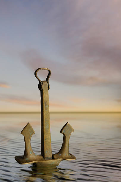istock Anchor on the beach after low tide . 97759650