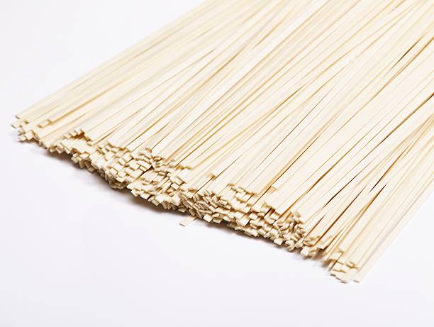 istock raw Chinese noodles against white background 97760396