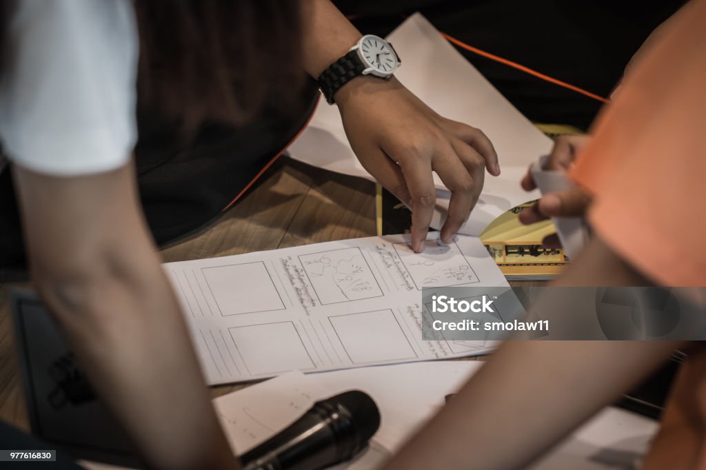 Asian Young Students or Start up Adolescents Co working team learning homework, writing story board for production in classroom, projected based learning in school Learning Stock Photo