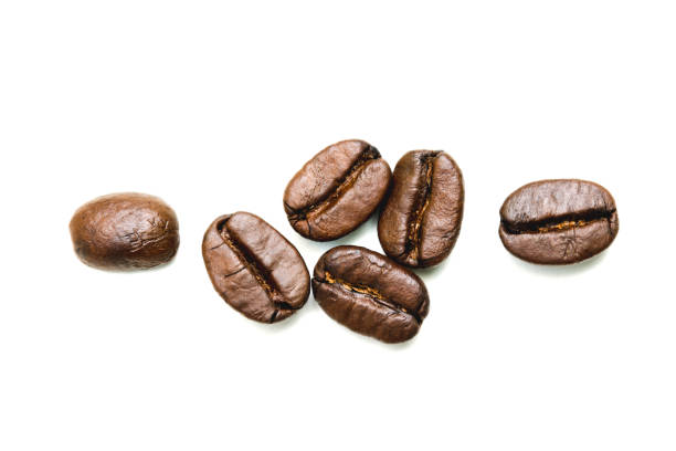 istock Close up coffee beans isolated on a white background. 977616912