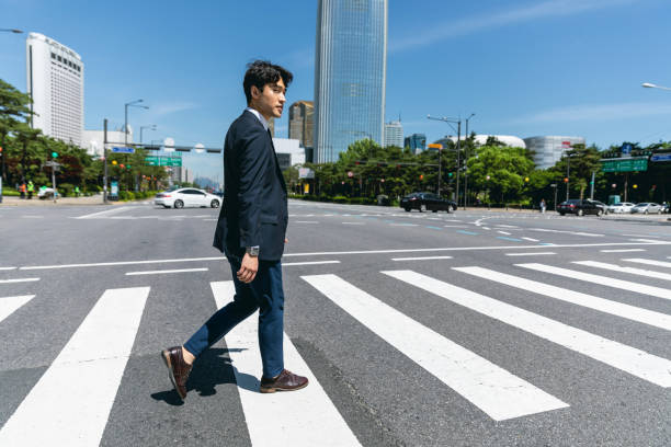 istock Businessman on the go in Seoul downtown 977644036