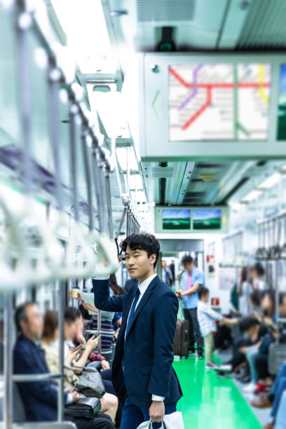 istock Businessman commuting by train in Seoul - South Korea 977644952