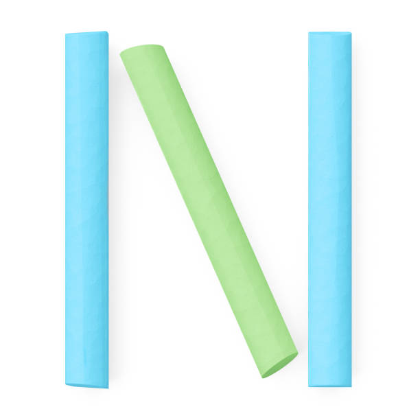 istock Colored sidewalk or blackboard chalks assembled like capital letter N on white background, 3D rendered font image 977647892