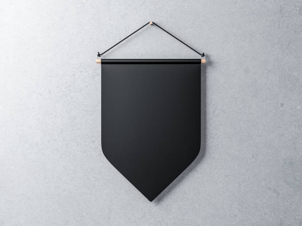 istock Blank Black pennant hanging on a concrete wall 977653820