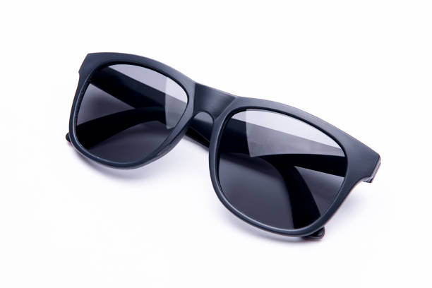 istock Black sunglasses with black plastic frame isolated on white background 977655000