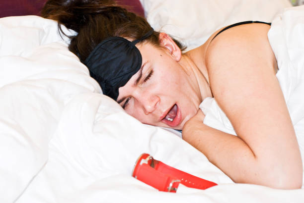 istock Young Woman Struggling To Fall Asleep 977667458