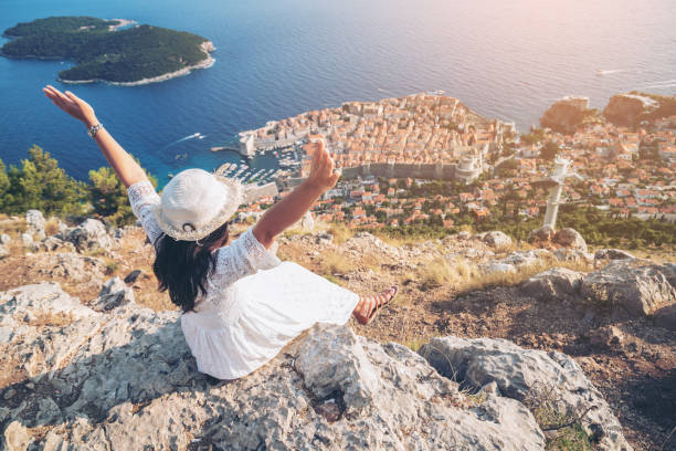 istock Traveller looking at view of Dubrovnik, Croatia 977671098
