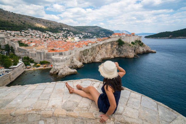 istock Traveller looking at view of Dubrovnik, Croatia 977671114